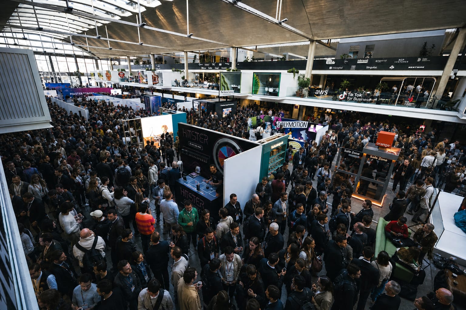 Aerial view of the venue with attendees flowing between the stands
